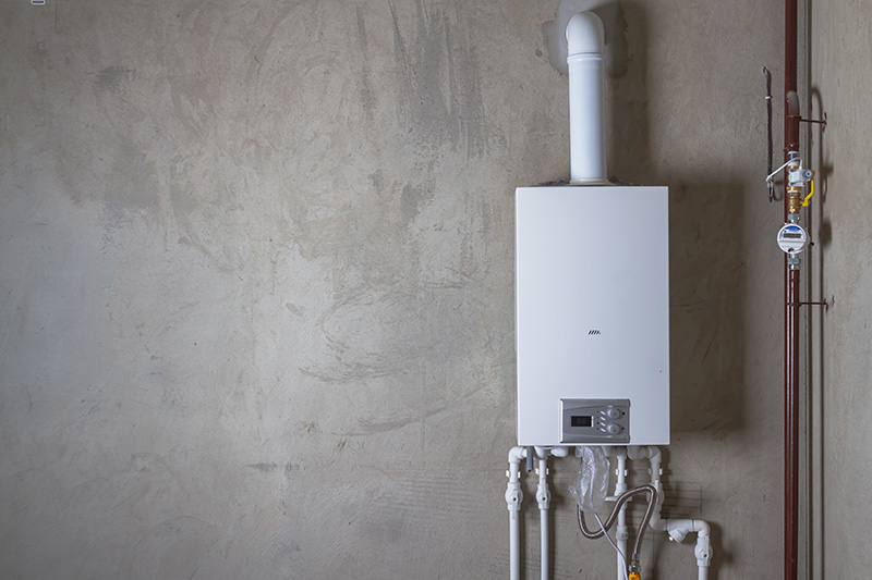 Tankless water heater on a wall.
