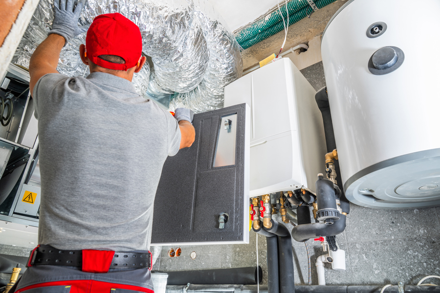 installer working on hvac system